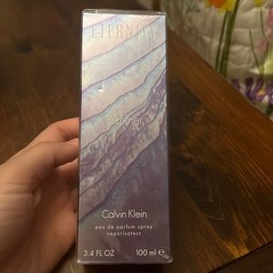 Calvin Klein Eternity summer perfume. Never used plastic seal on top is opening
